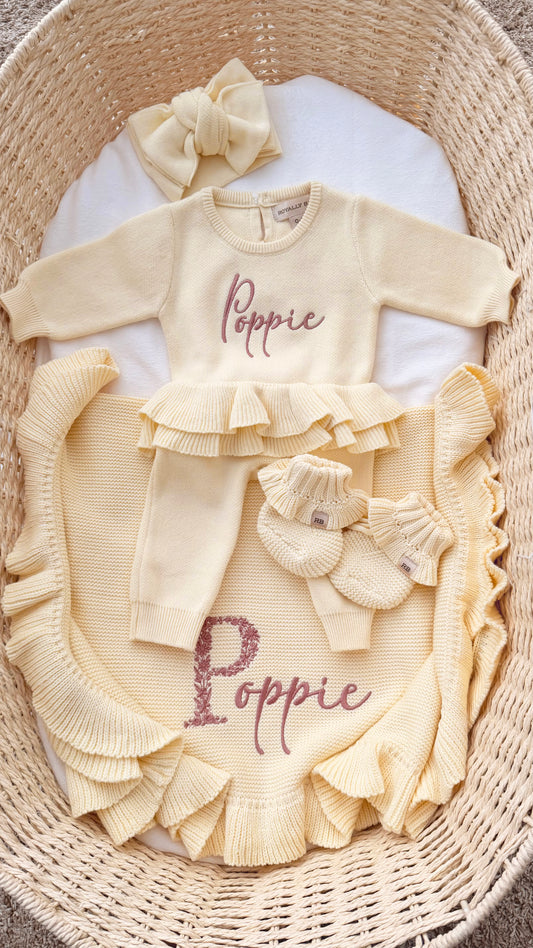 Personalized Buttercream Yellow Ballerina long romper set with matching bow, ruffle booties, and knit blanket