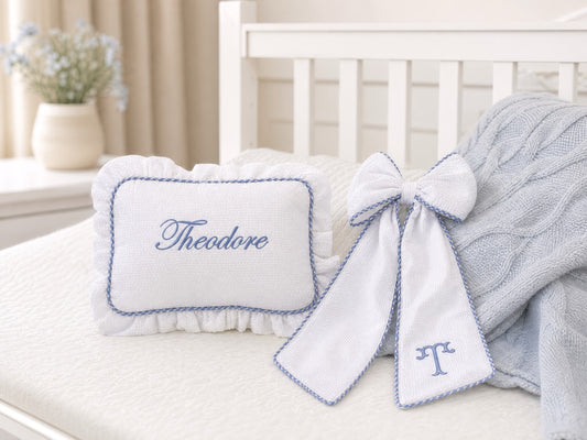 Baby Name Keepsake Pillow with gingham trim, styled lifestyle shot