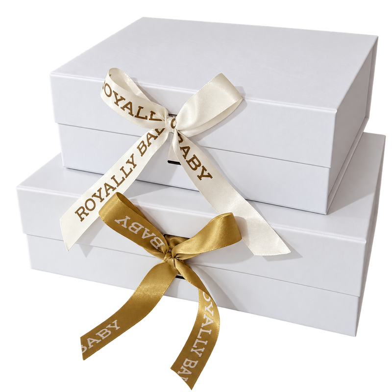 Royally Baby signature gift boxes tied with a Royally Baby ribbon