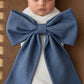 Newborn baby wearing personalized blue denim look cotton sash with oversized bow, soft hospital announcement outfit keepsake gift for baby boy