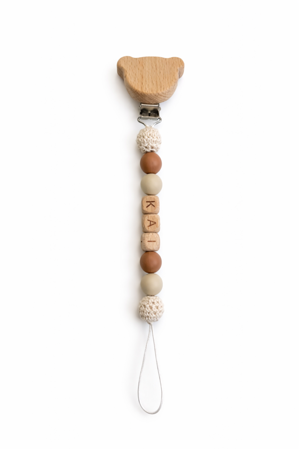 Personalized pacifier clip with the name Kai, neutral and brown beads, and wooden bear clasp, a secure and practical everyday baby essential