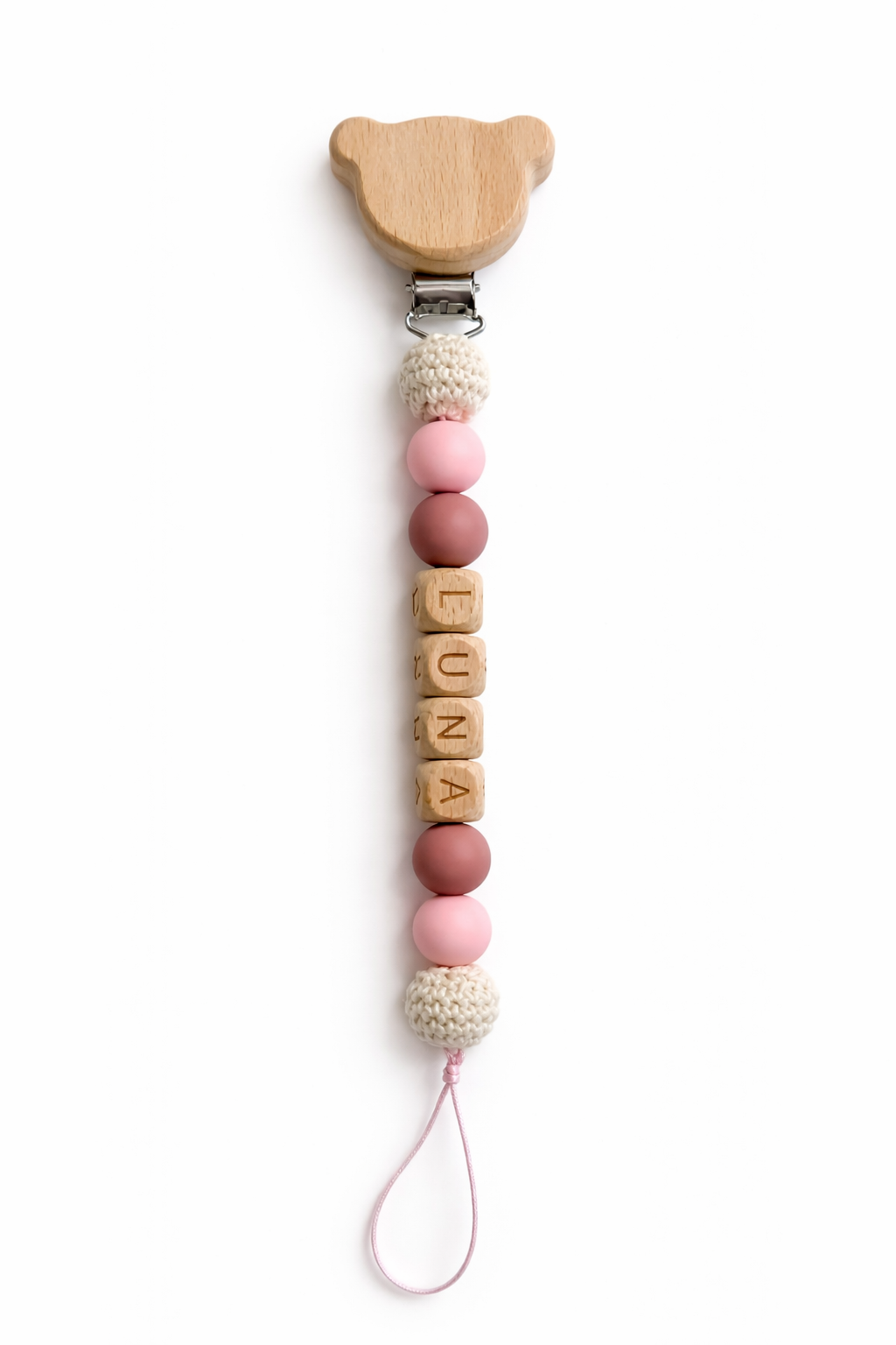 Personalized pacifier clip with the name Luna, soft pink and neutral beads, and wooden bear clasp, a secure and meaningful everyday baby essential