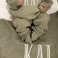 Newborn wearing a personalized Soft Sage Kimono Romper Set with matching bear-ear hat and blanket