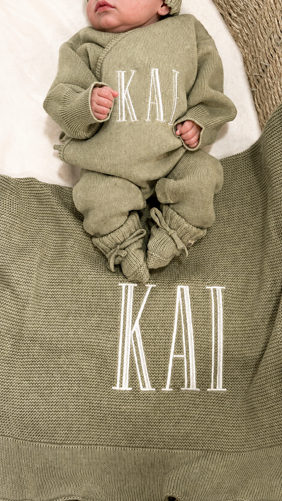 Newborn wearing a personalized Soft Sage Kimono Romper Set with matching bear-ear hat and blanket