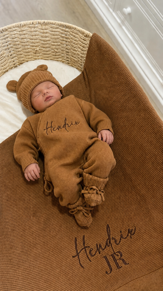 Newborn wearing a personalized Teddy Brown Kimono Romper Set with matching bear-ear hat