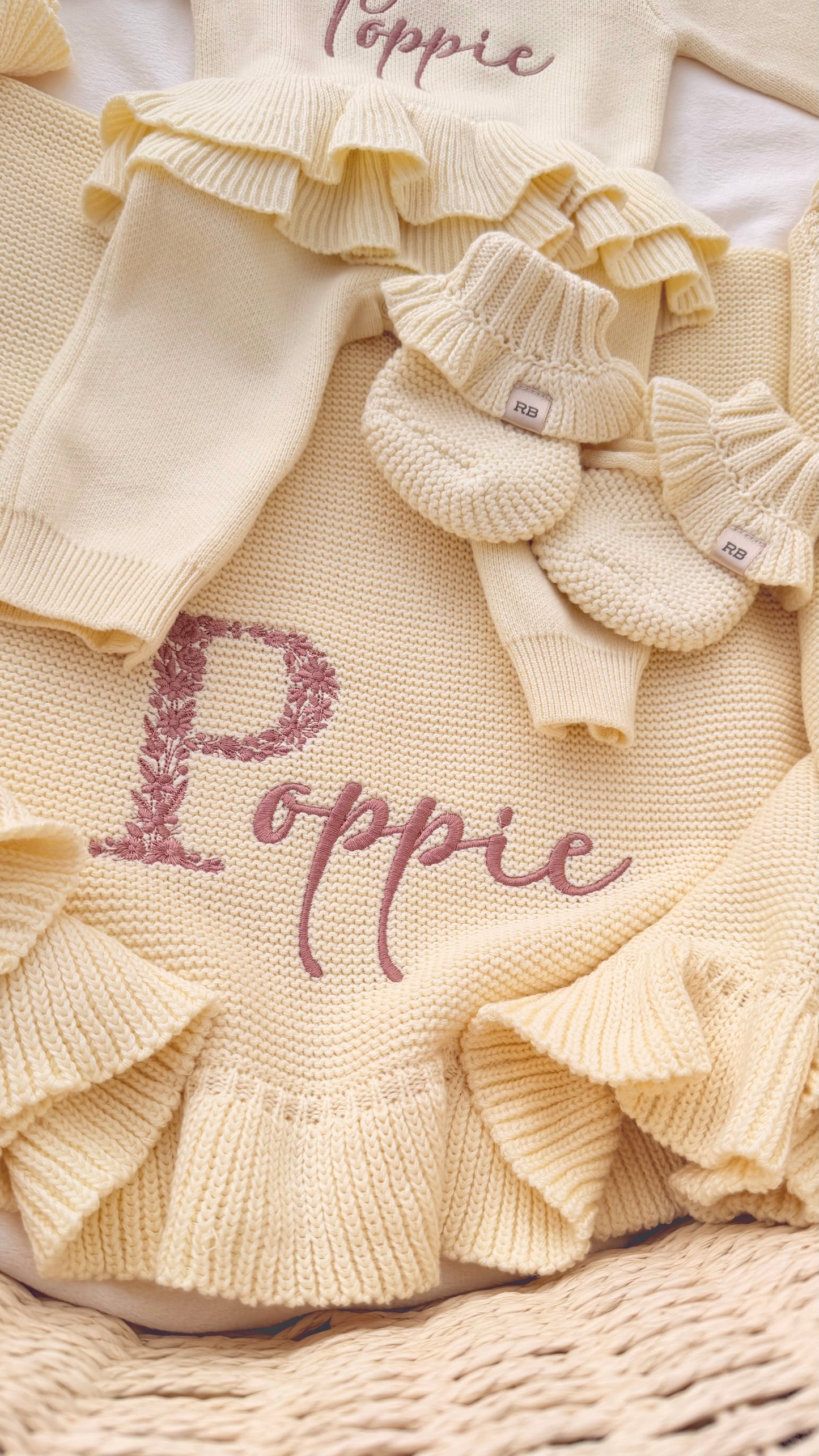 Personalized Buttercream Yellow ruffle knit blanket embroidered with Poppie, matching bow, and ruffle booties