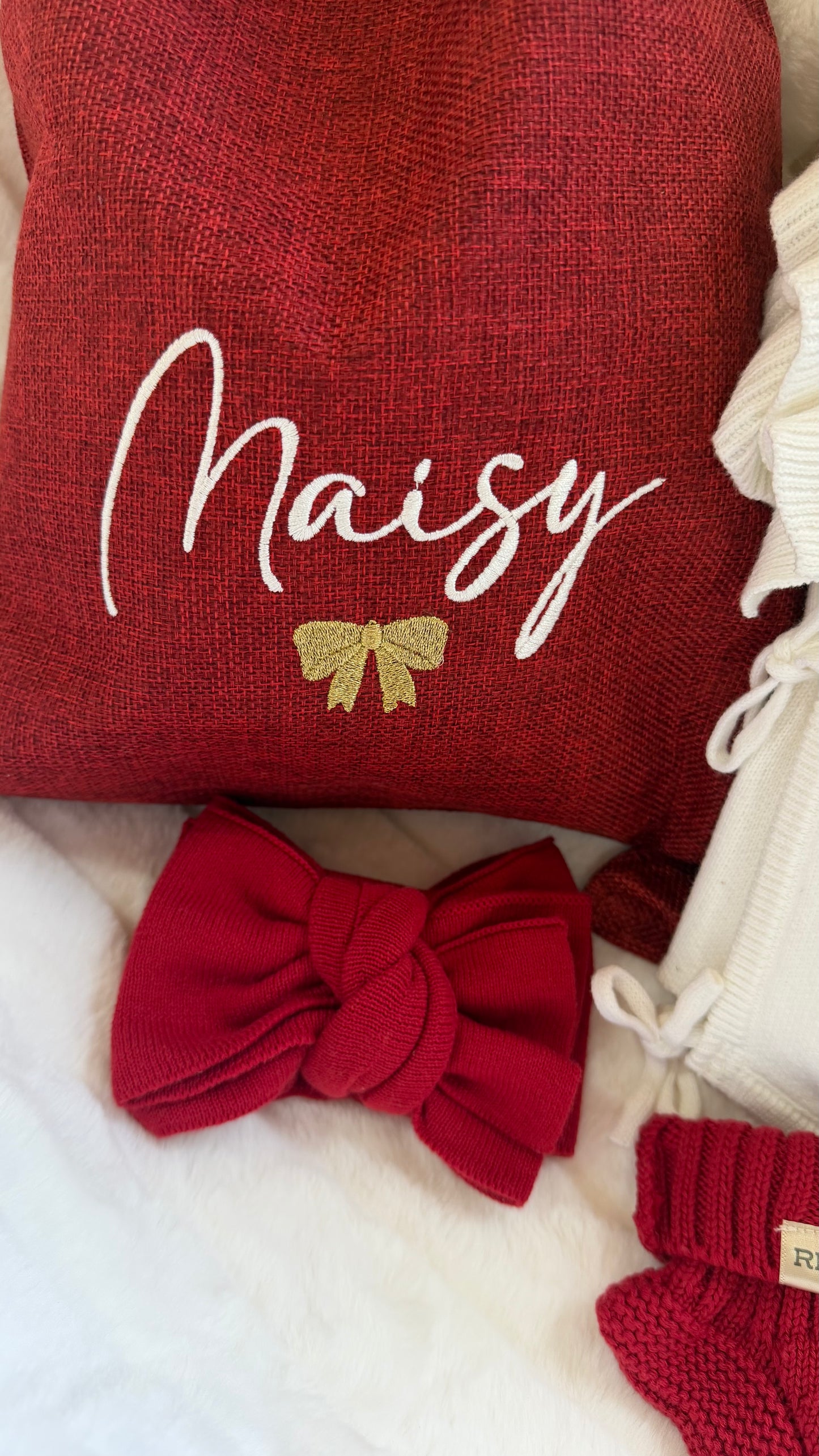 Close-up of embroidered name detail on a personalized Christmas gift sack