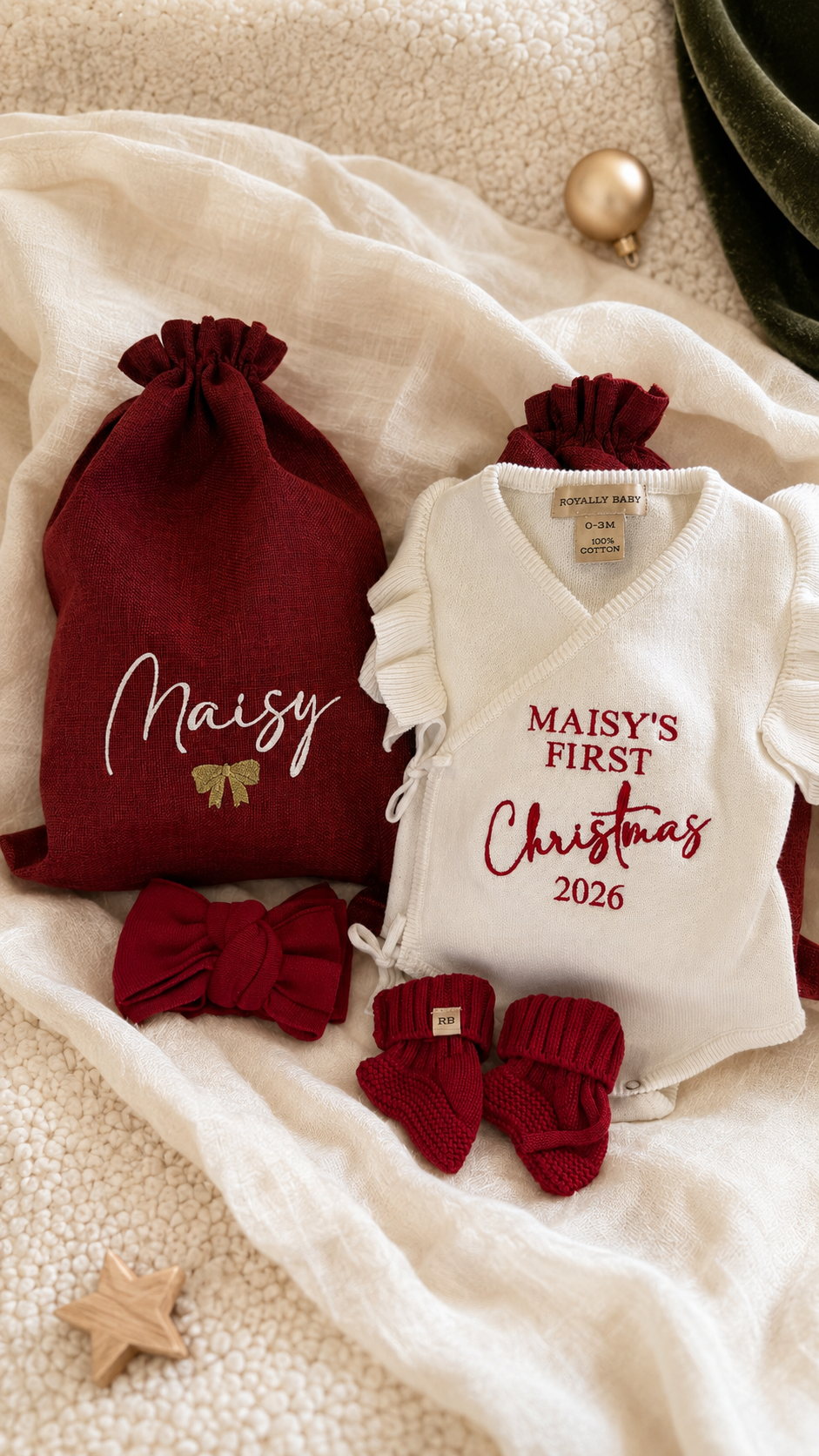 Personalized Christmas gift sack embroidered with a name and finished with a golden bow