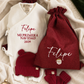 Personalized Christmas gift sack embroidered with a name and finished with a Santa Claus icon