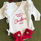 Personalized Christmas romper set flat lay with matching accessories