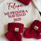 Close-up of personalized name embroidery on a Christmas romper
