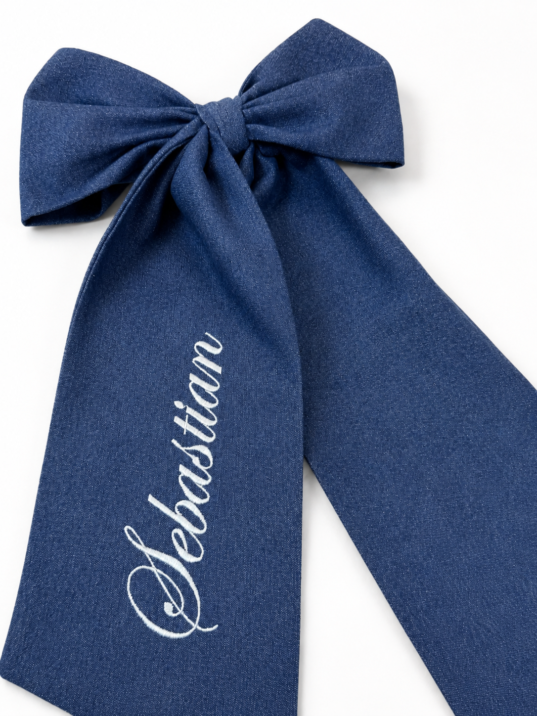 Newborn wearing the Full Name bow sash, styled for hospital coming home photos