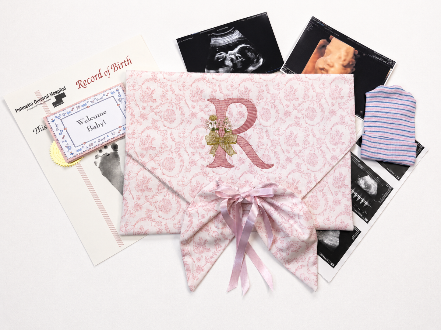 Personalized keepsake envelope styled flat lay with ribbon detail