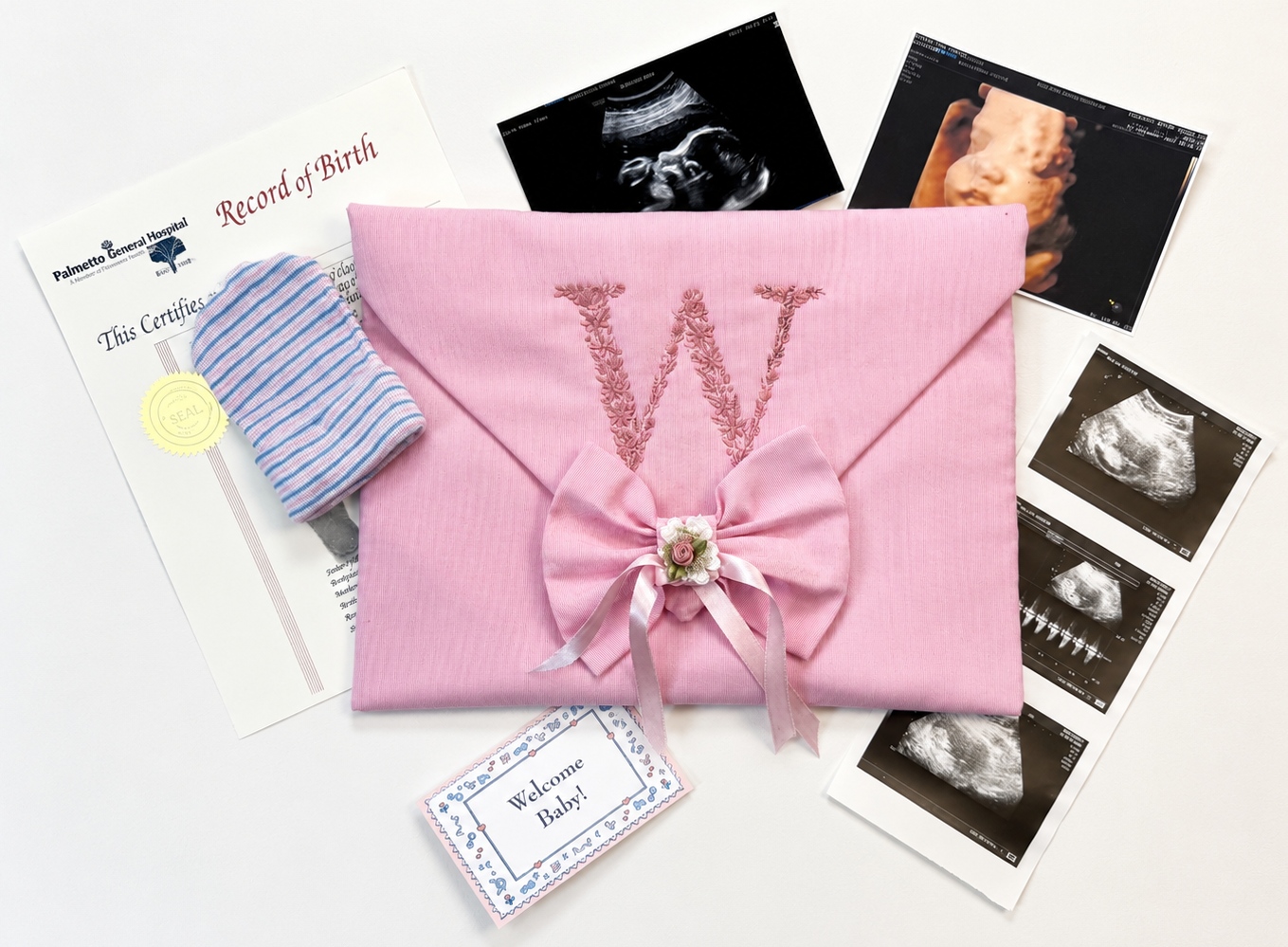 Personalized baby keepsake envelope, side angle showing fabric trim
