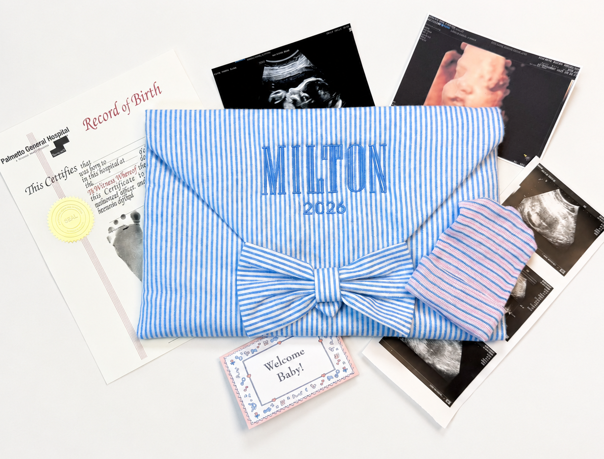First Moments Keepsake Envelope holding birth record and hospital keepsakes