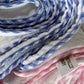 Muslin Gingham Trim Blanket lifestyle shot