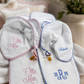 2-piece muslin lovey and burp cloth set in pink gingham, flat lay