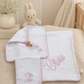 Embroidered muslin pacifier lovey detail from 3-piece pink gingham set