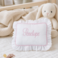 Close-up of embroidered name detail on keepsake pillow