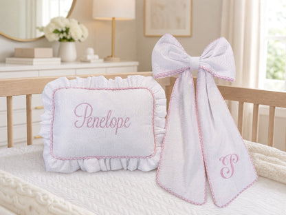 Close-up of the pre-made bow on the Baby Name Pillow and Bow Sash Set