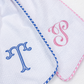 Baby Name Pillow and Bow Sash Set styled in a nursery setting