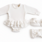 Personalized Soft Ivory newborn outfit set with embroidered name, including ballerina romper, booties, and headband