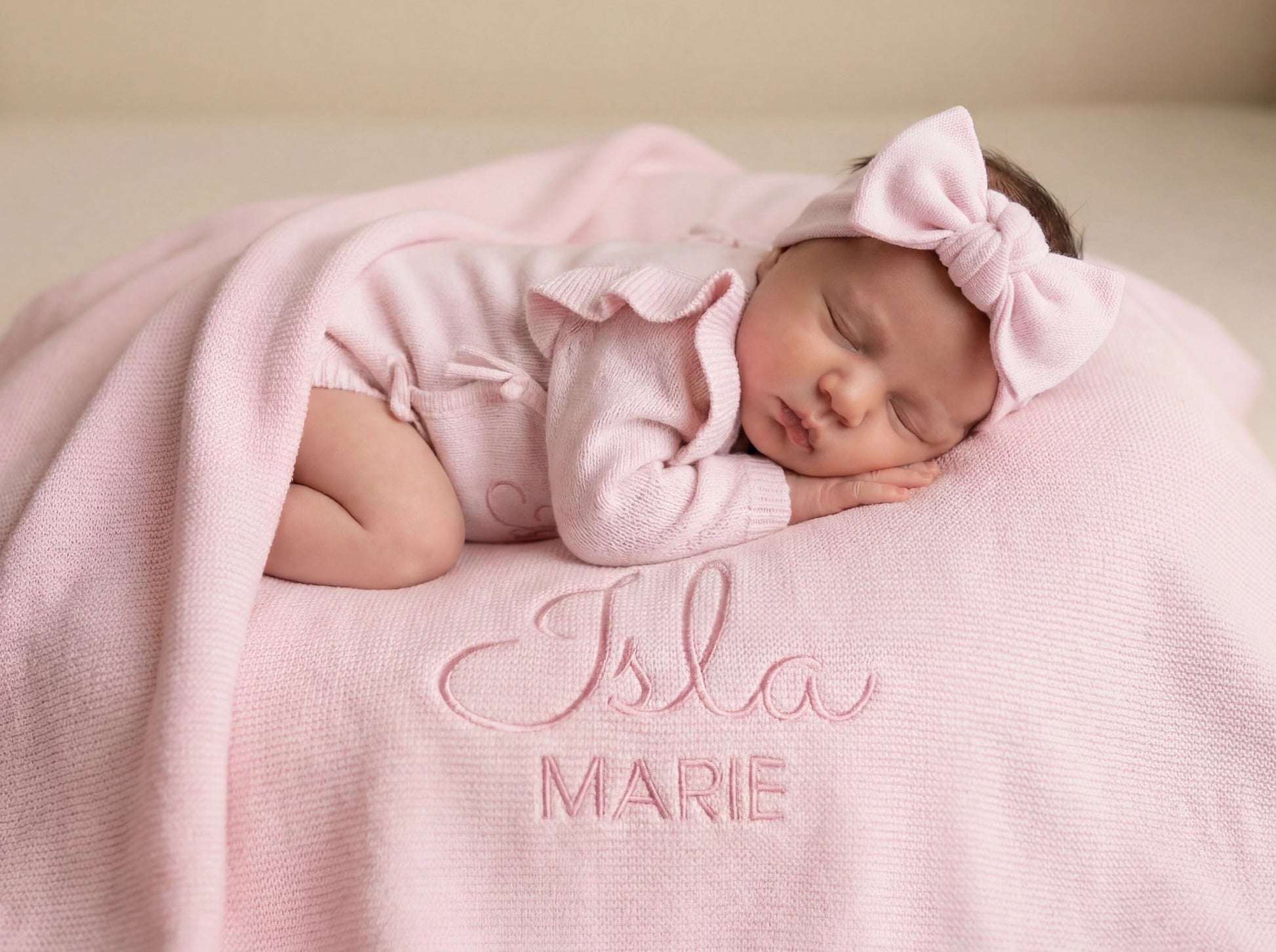 Newborn wearing personalized petal pink Butterfly romper with matching personalized blanket