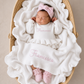 Newborn wearing personalized white and pink Ballerina romper, short style, styled lifestyle shot