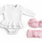 Newborn wearing personalized white Ballerina romper with petal pink bow and booties